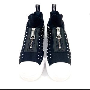 Schutz Black zip front studded slip on sneakers